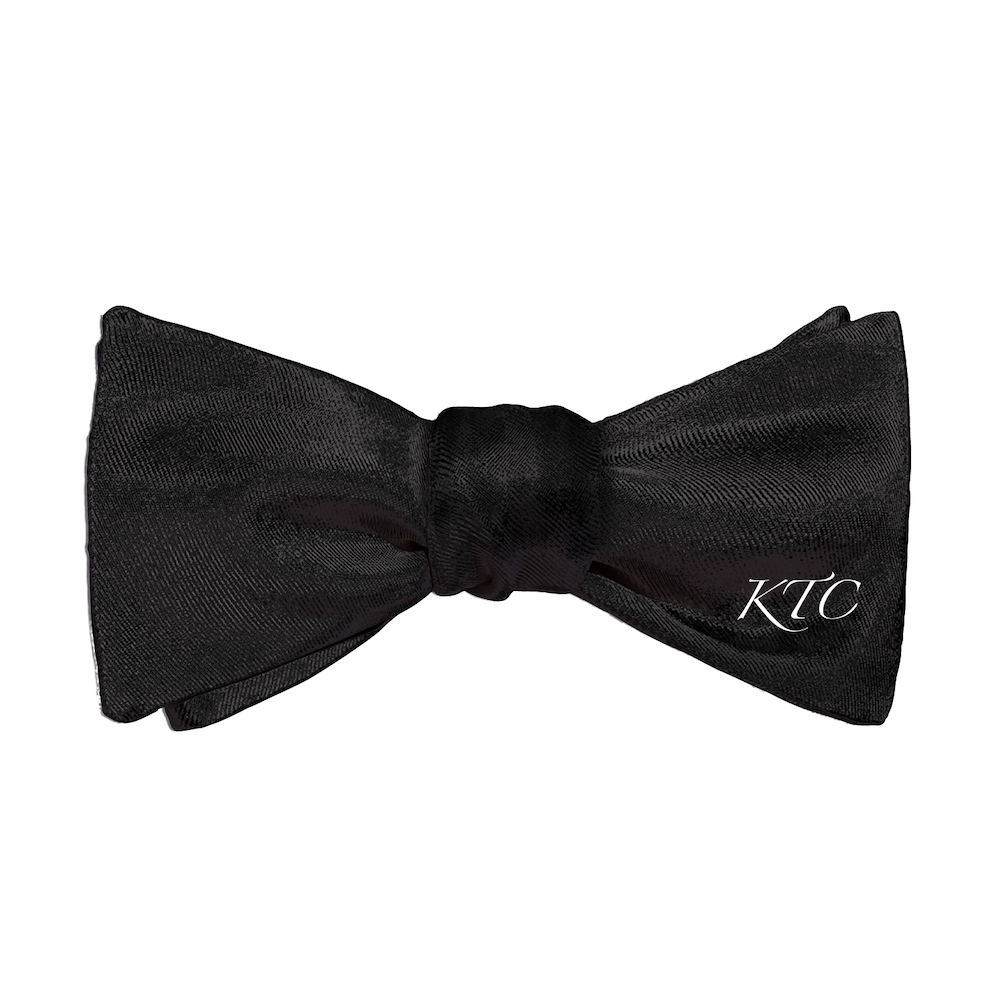 Black bow tie with personalized initials in script font