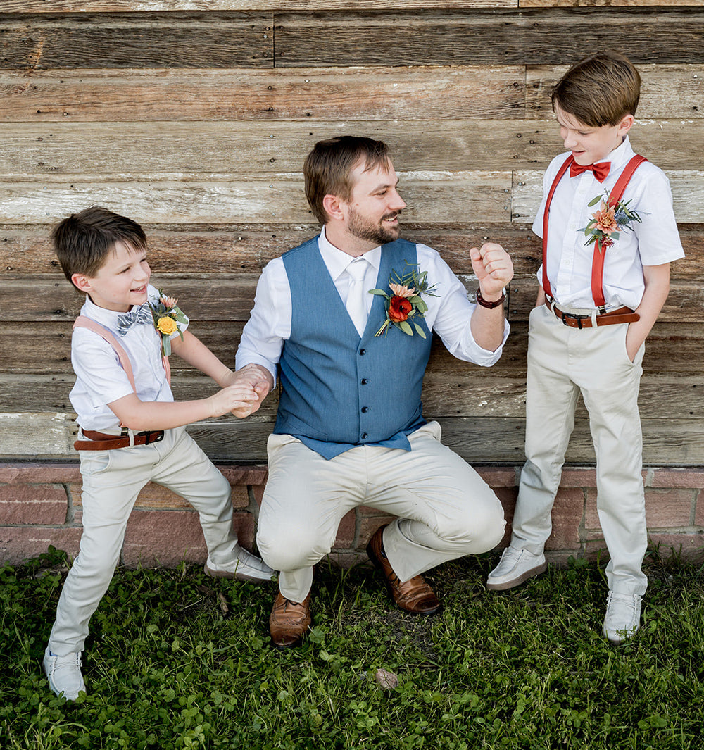 dad with two sons dressed up in wedding attire