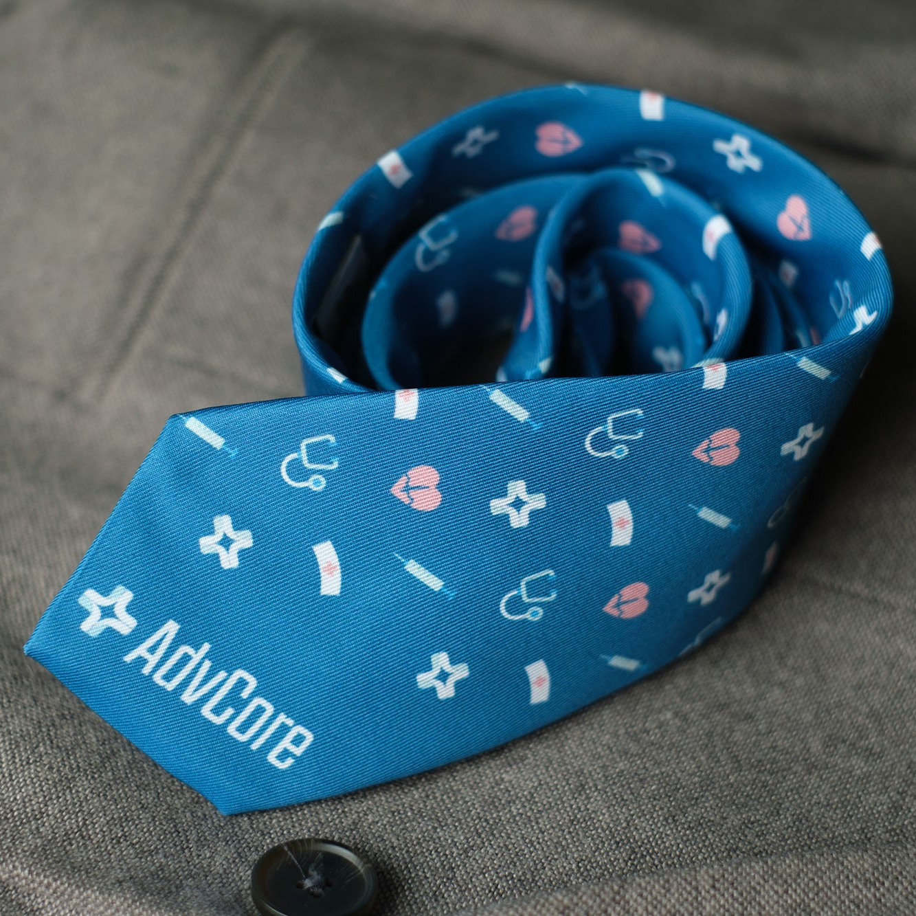 custom medical themed branded necktie rolled up