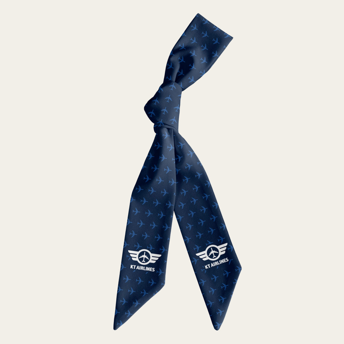 Blue hair scarf with airplane pattern and KT Airlines logo on a white background
