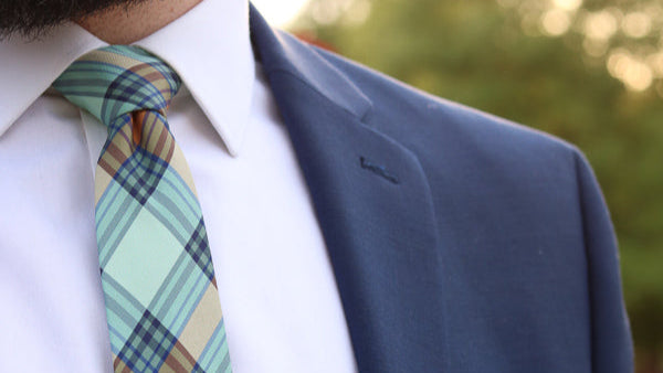 Plaid necktie recolored with custom colors worn with blue jacket