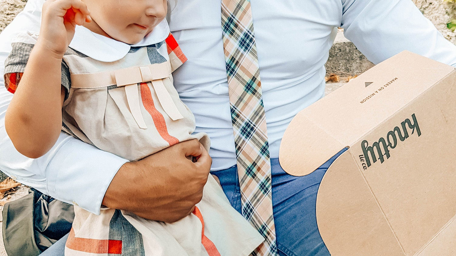 Daughter gifting custom tie to father
