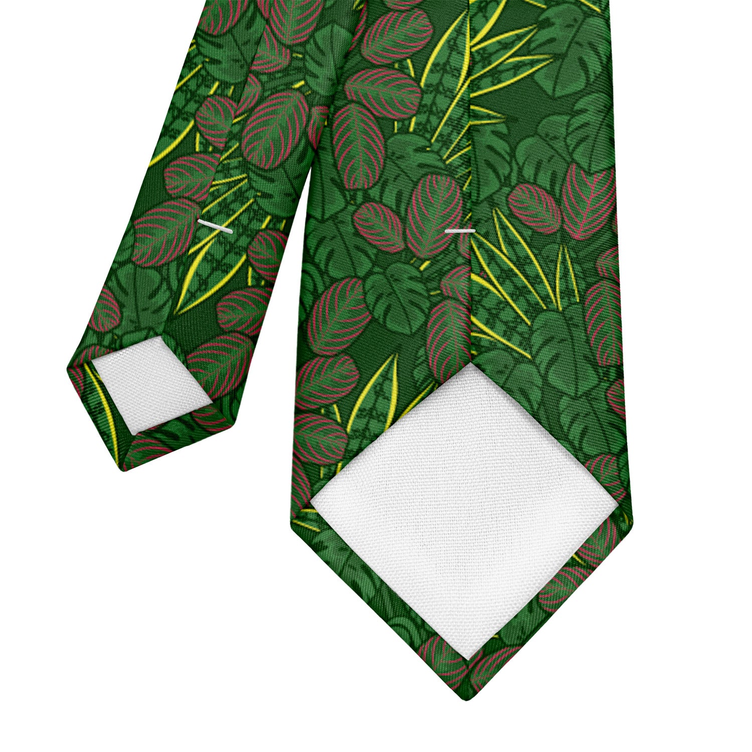 Green leaf-patterned pocket square in a brown suit pocket
