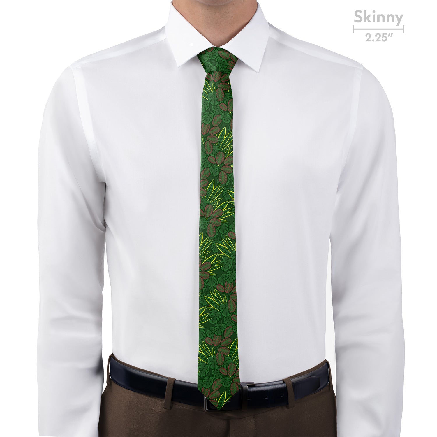Green leaf-patterned pocket square in a brown suit pocket