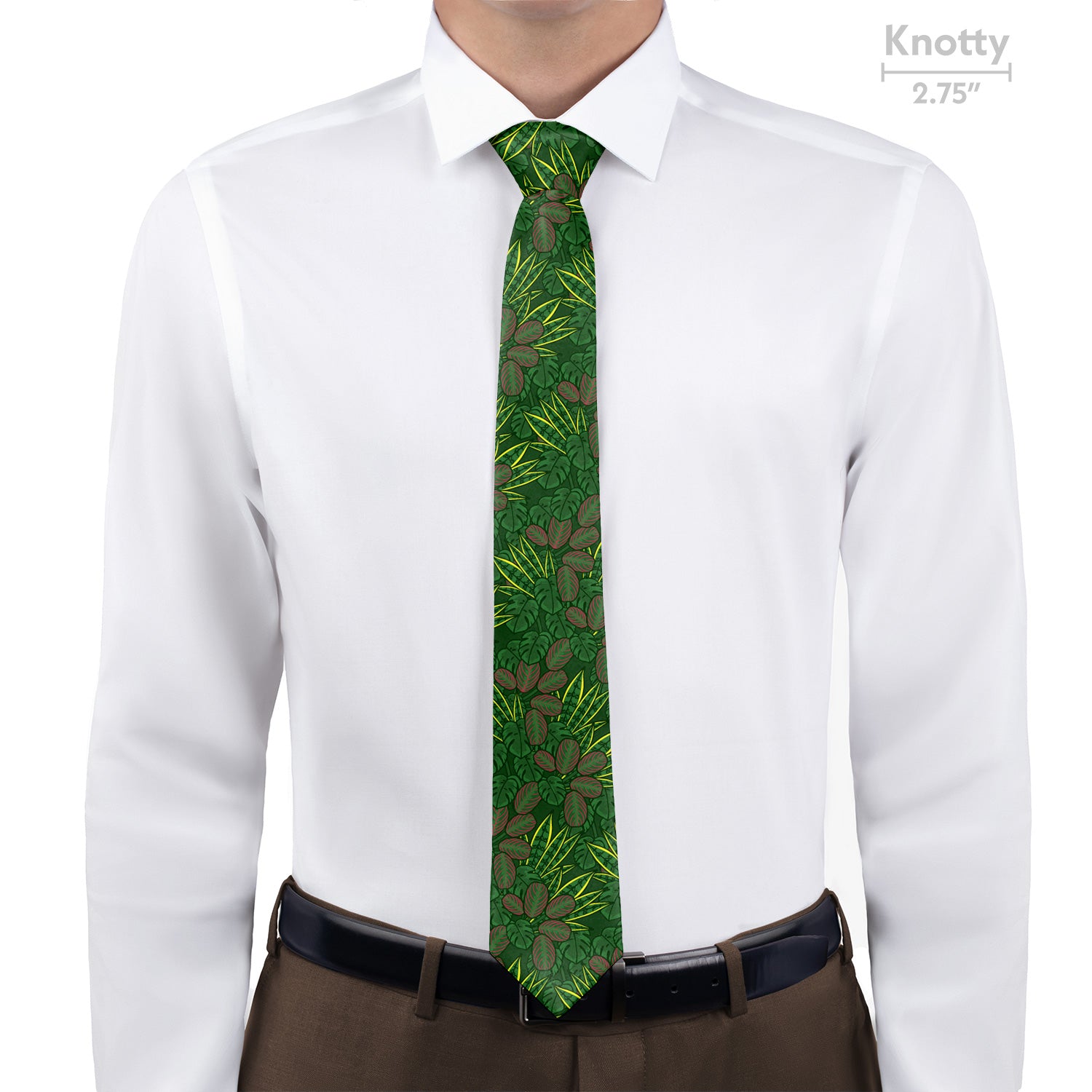 Green patterned tie worn with a white shirt and brown pants on a white background