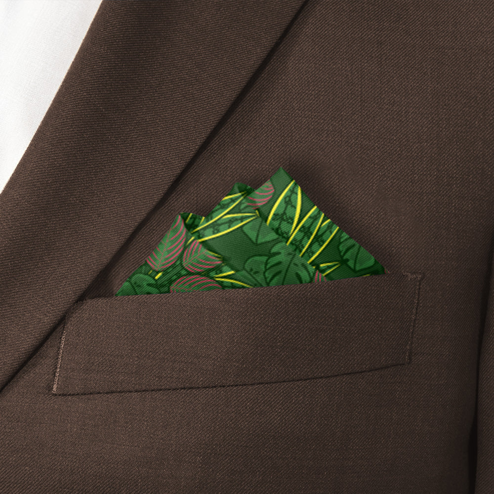 Green houseplant leaf-patterned pocket square in a brown suit pocket