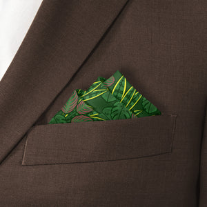 Green houseplant leaf-patterned pocket square in a brown suit pocket
