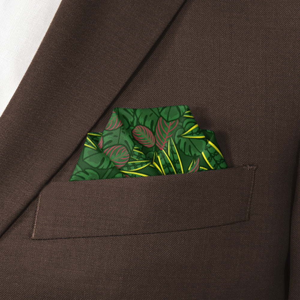 Green houseplant leaf-patterned pocket square in a brown suit pocket