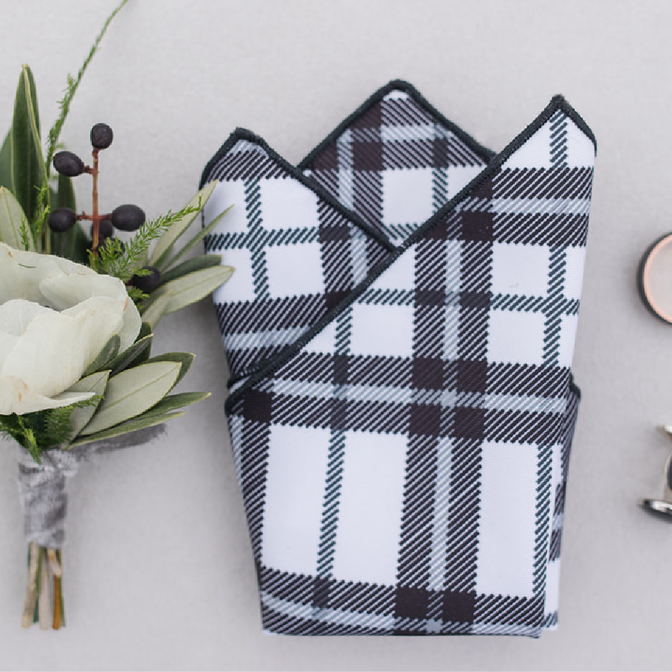 Black and white plaid pocket square folded