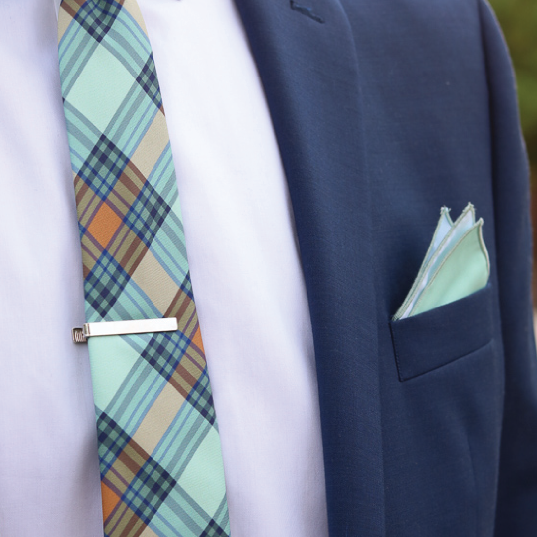 green plaid necktie and solid green pocket square