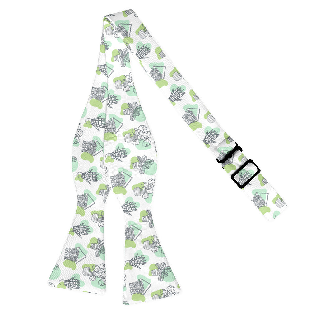 Potted plant patterned bow tie on a white background