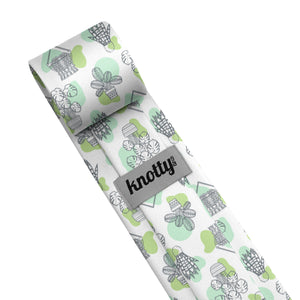 Necktie with potted plant pattern and 'knotty' branding on a white background