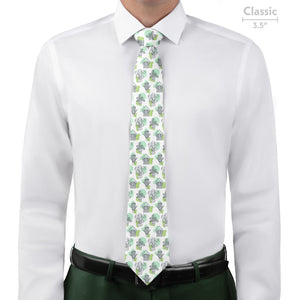 Man wearing a white shirt with a patterned potted plant green tie on a white background