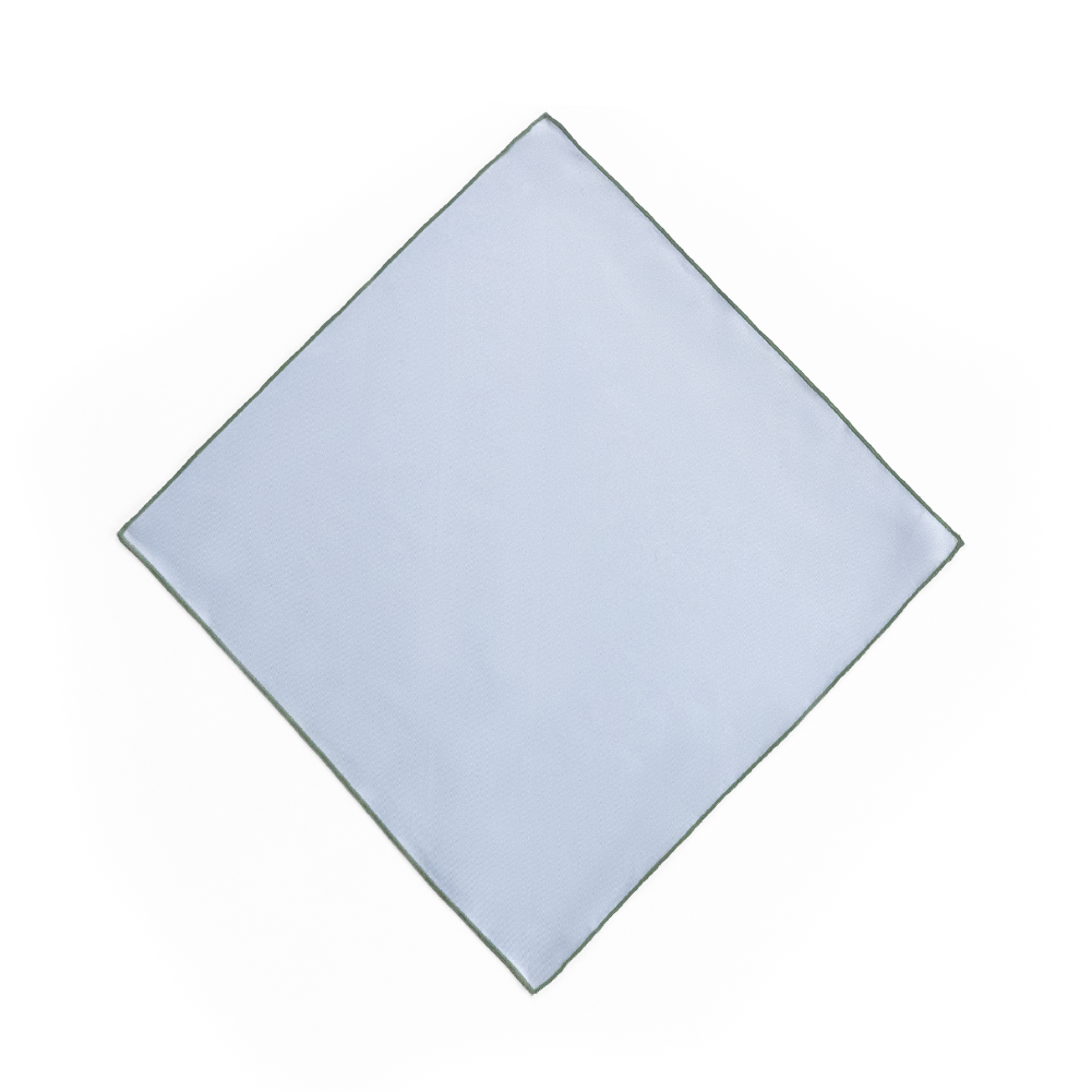 The white, unprinted side of a pocket square in a diamond shape.