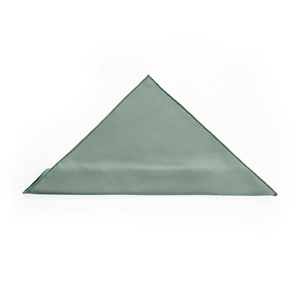 A folded square pocket square in a muted sage green color.