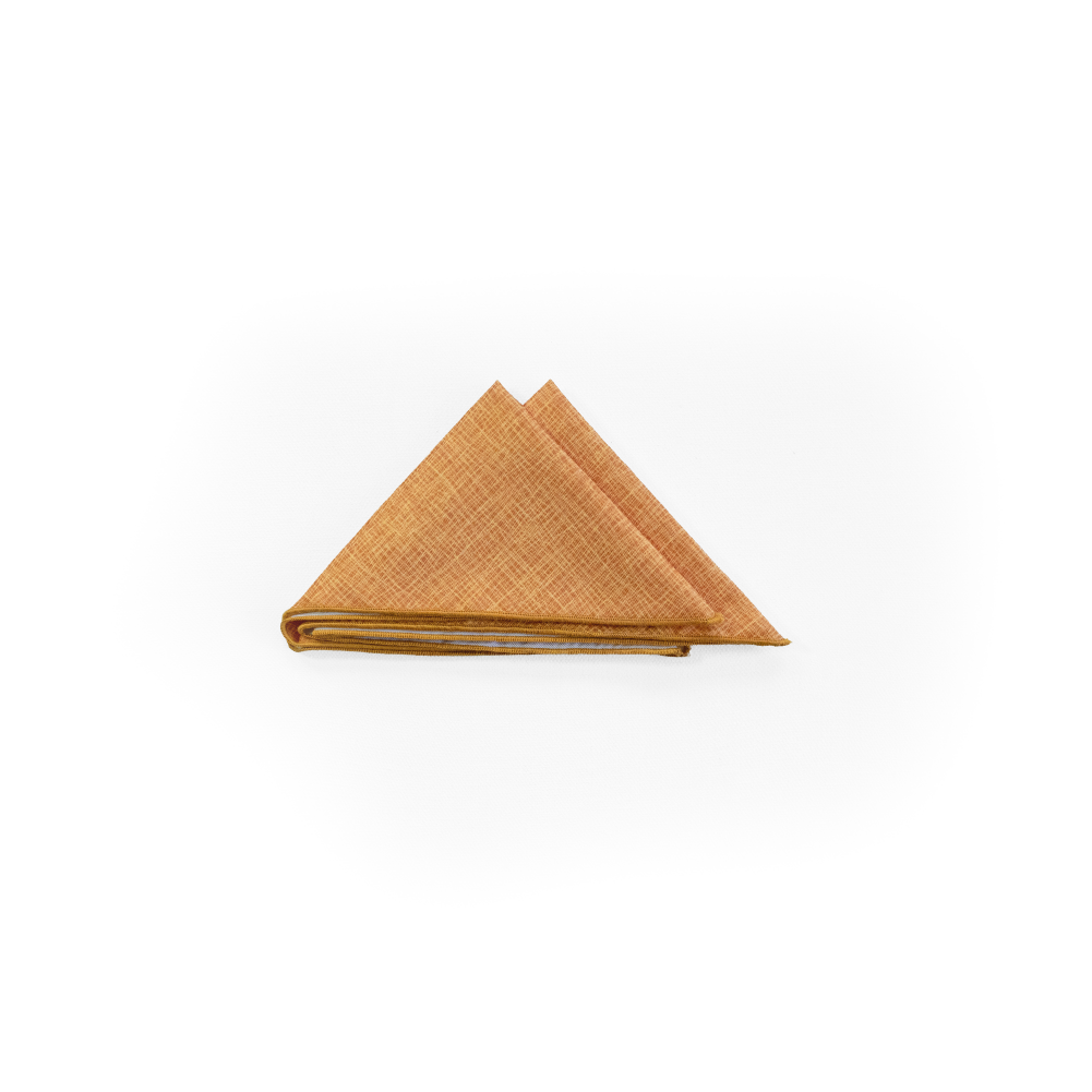 A folded tan twill fabric pocket square with a subtle basketweave pattern.