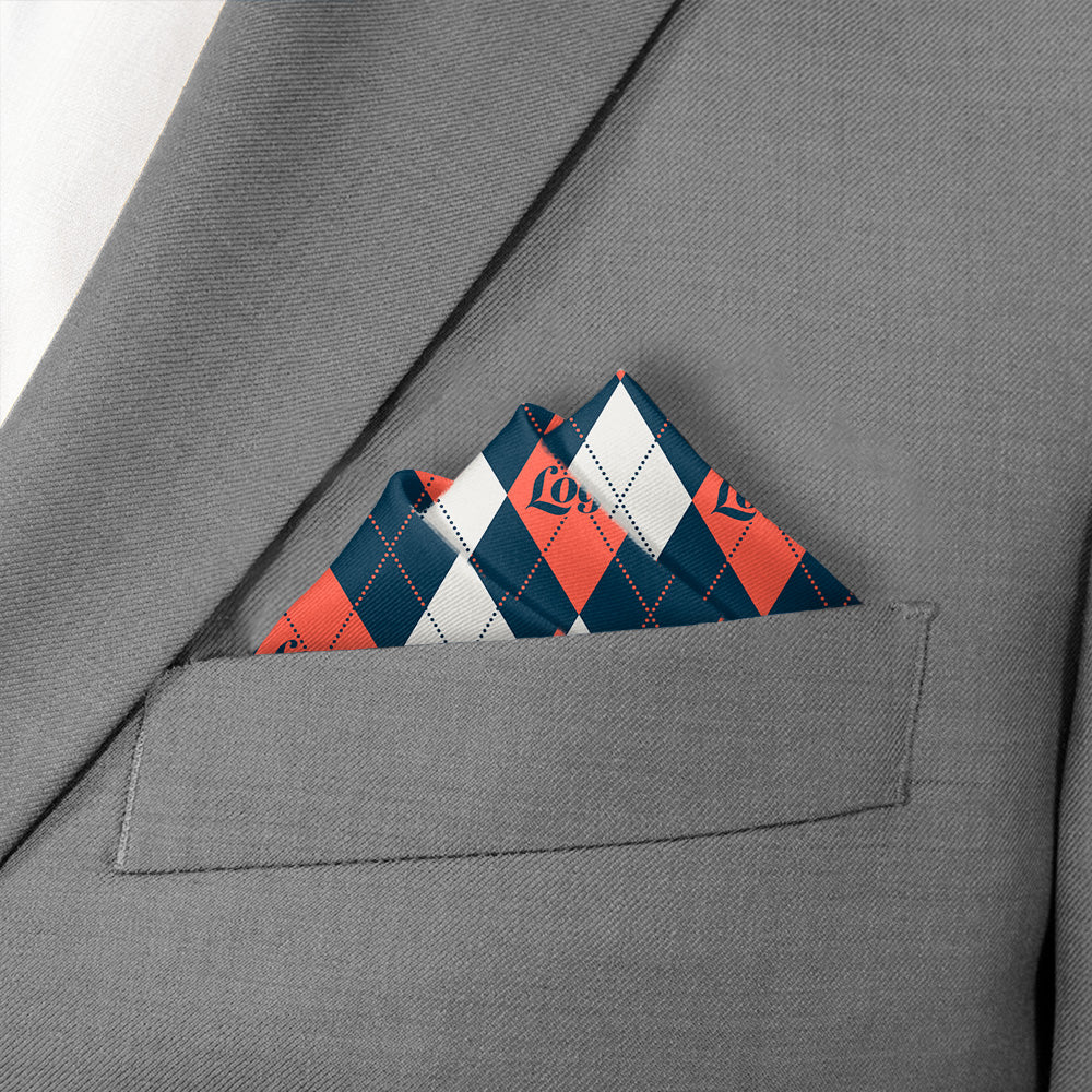 Gray suit jacket with a patterned pocket square featuring red, white, and blue colors.