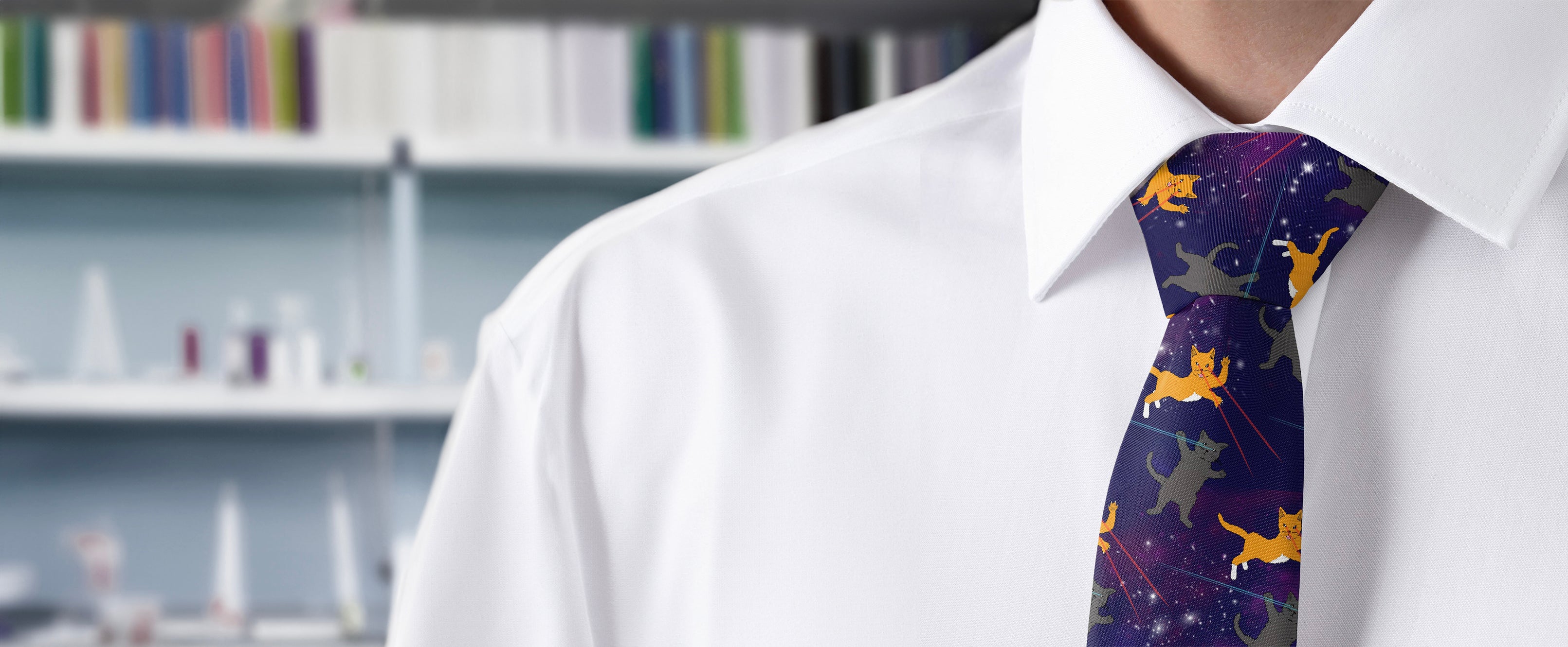 man wearing a cat themed necktie