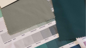 Fabric swatches with color names on a textured fabric background