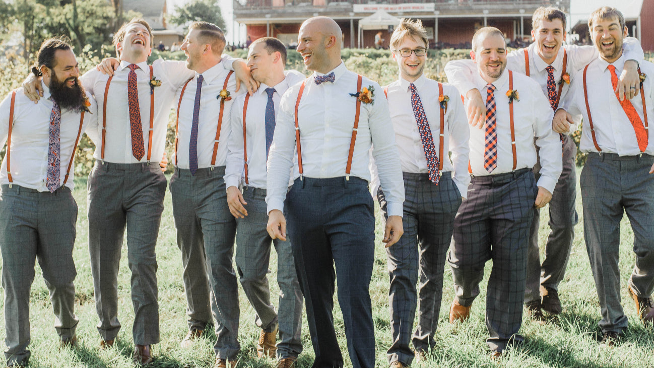 Groomsmen and groom with mix and match patterns recolored with the same color palette