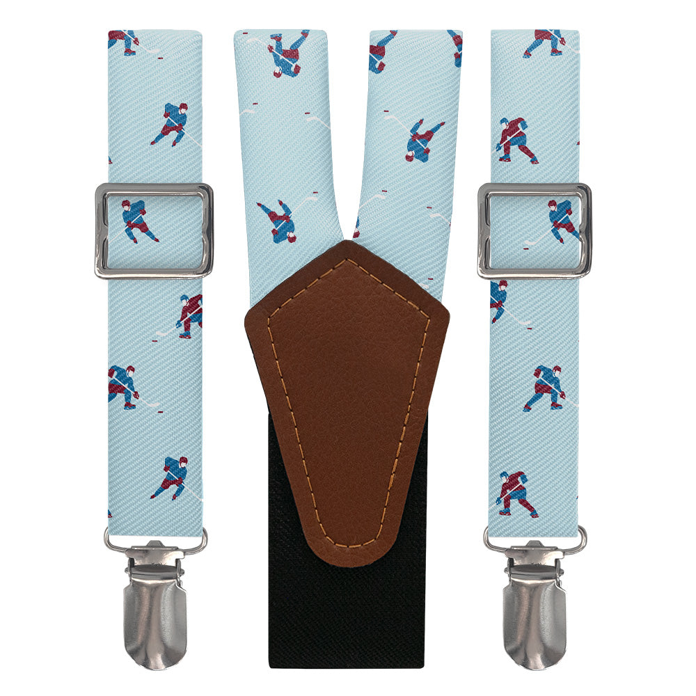 Suspenders with hockey player pattern on a light blue background.