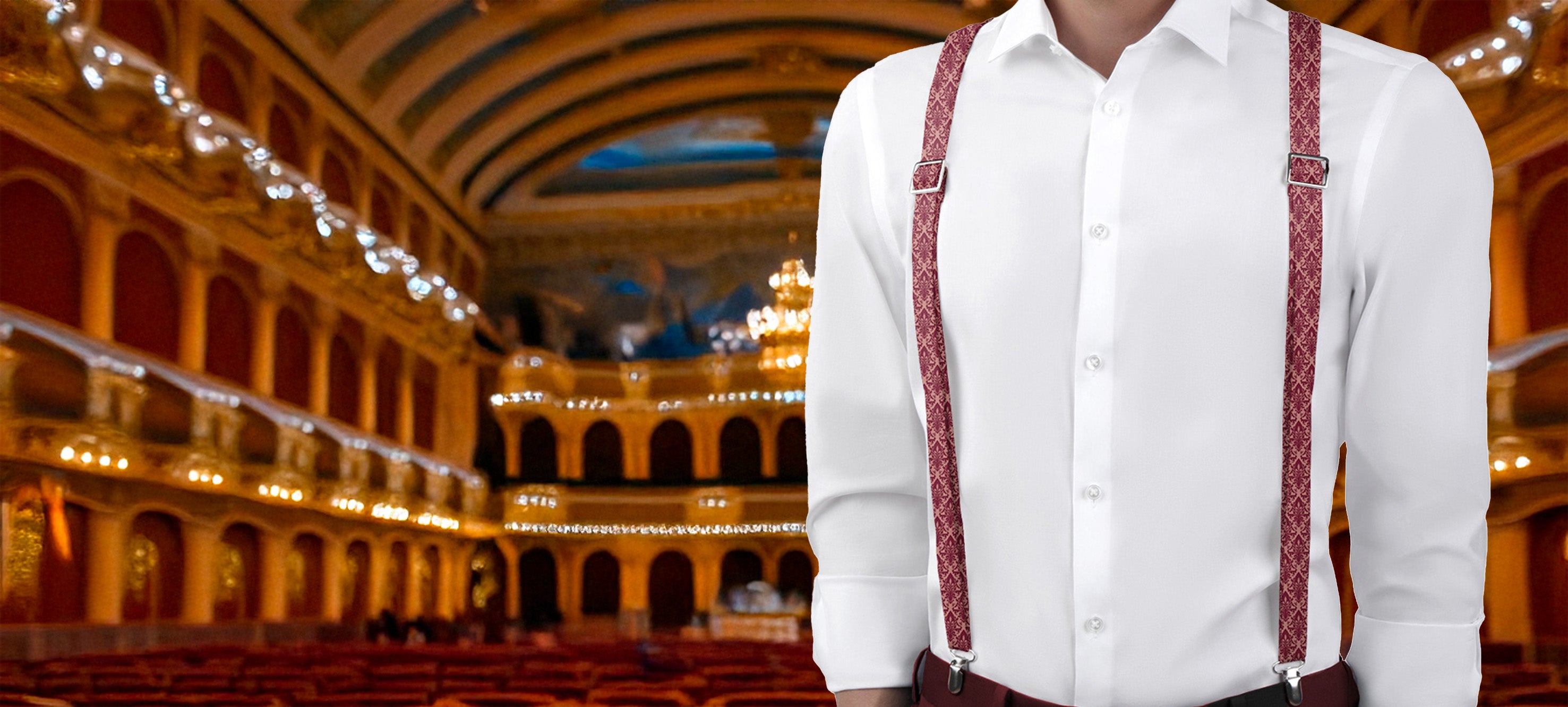Person wearing a white shirt and ornate suspenders standing in an elegant indoor setting with arches and lights.