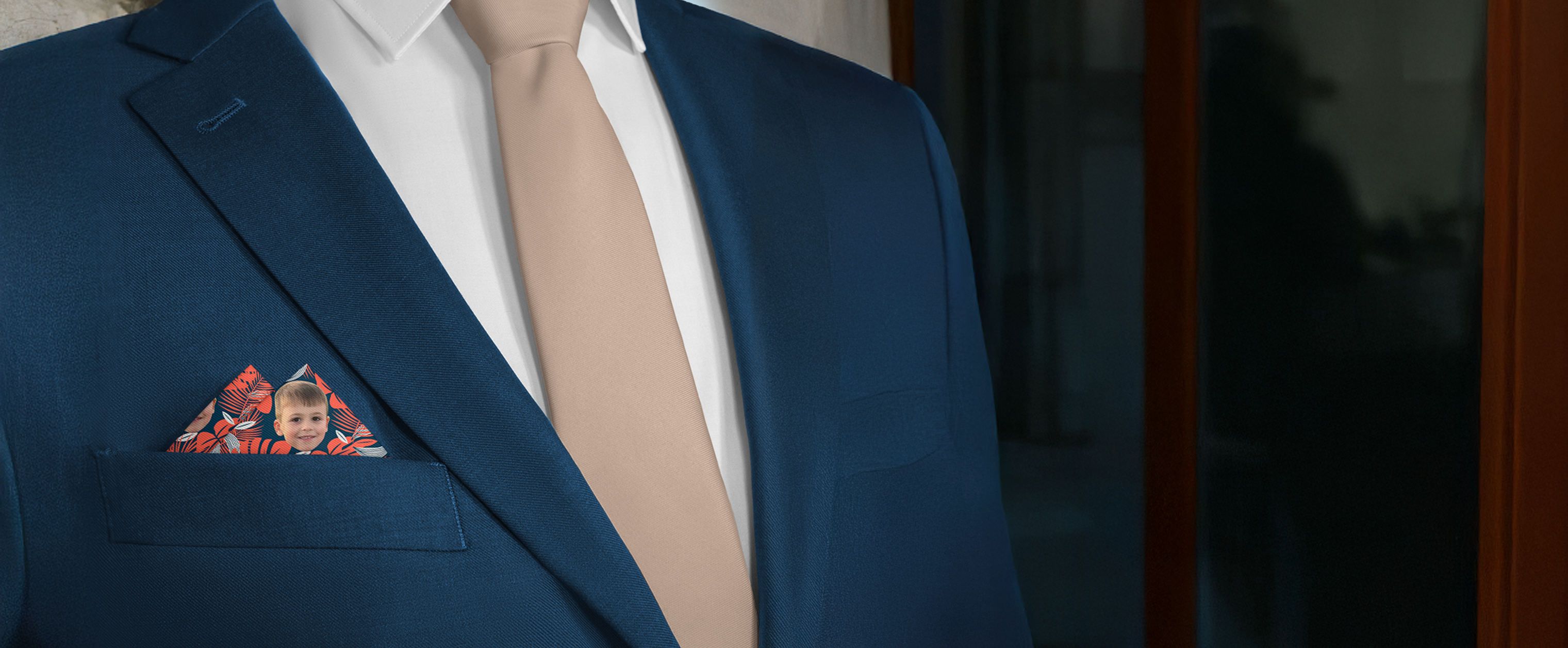 photo pocket square in pocket of suit worn by person