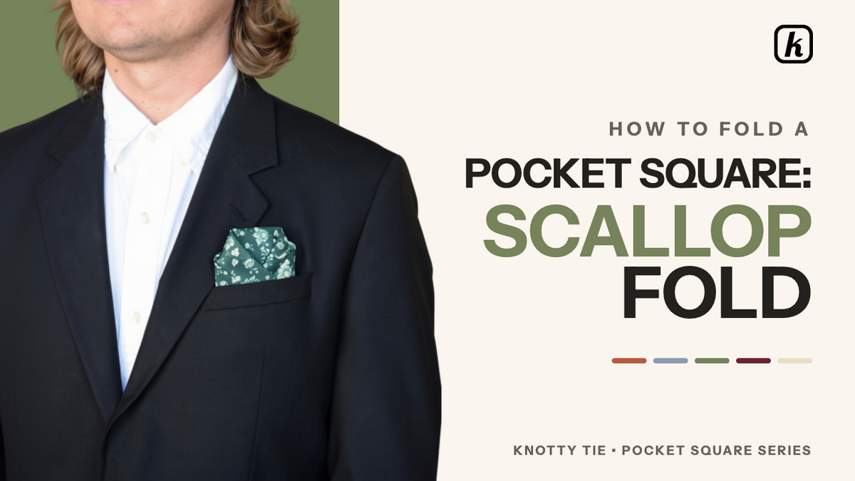 Load video: Preparation and Initial Pleats:The scallop fold is ideal for formal occasions and requires some practice and patience.Lay the pocket square flat in a diamond formation with the printed side facing up.Identify a line approximately 2 inches below the center, pinch the fabric, and fold it upward to create a 1-inch pleat.Find another line above the first pleat, pinch it, and fold the top point behind the square to form a second pleat that rests just above the first one.Creating the Scallop Shape:Rotate the pocket square and flip it over so the triangle is pointing downward.Fold the right corner downward at a 45-degree angle.Fold the left corner downward in the same manner, allowing it to overlap the right side to complete the scallop.Final Adjustments and Styling:Fold the bottom edge behind the square to reduce its length.Tuck in the left and right sides to adjust the width so it fits your pocket.Insert the pocket square into the breast pocket with the scallop side facing up, ensuring it is positioned parallel to the top of the pocket.The style can be further enhanced by using a custom color; customization options are available at naughty.com.