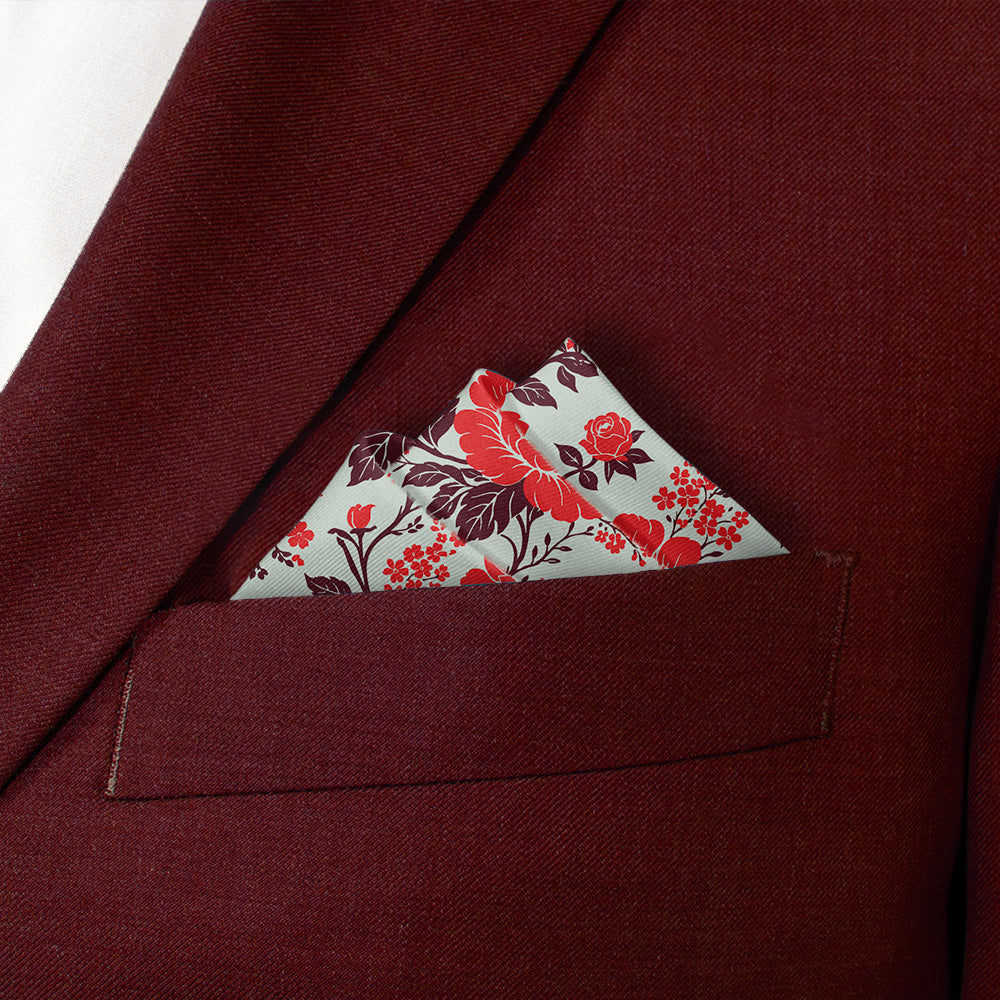 Floral pocket square in a burgundy blazer pocket