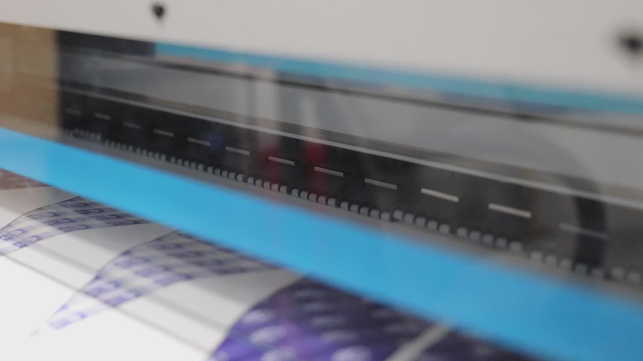 Load video: printer printing dye sublimation patterns for neckties