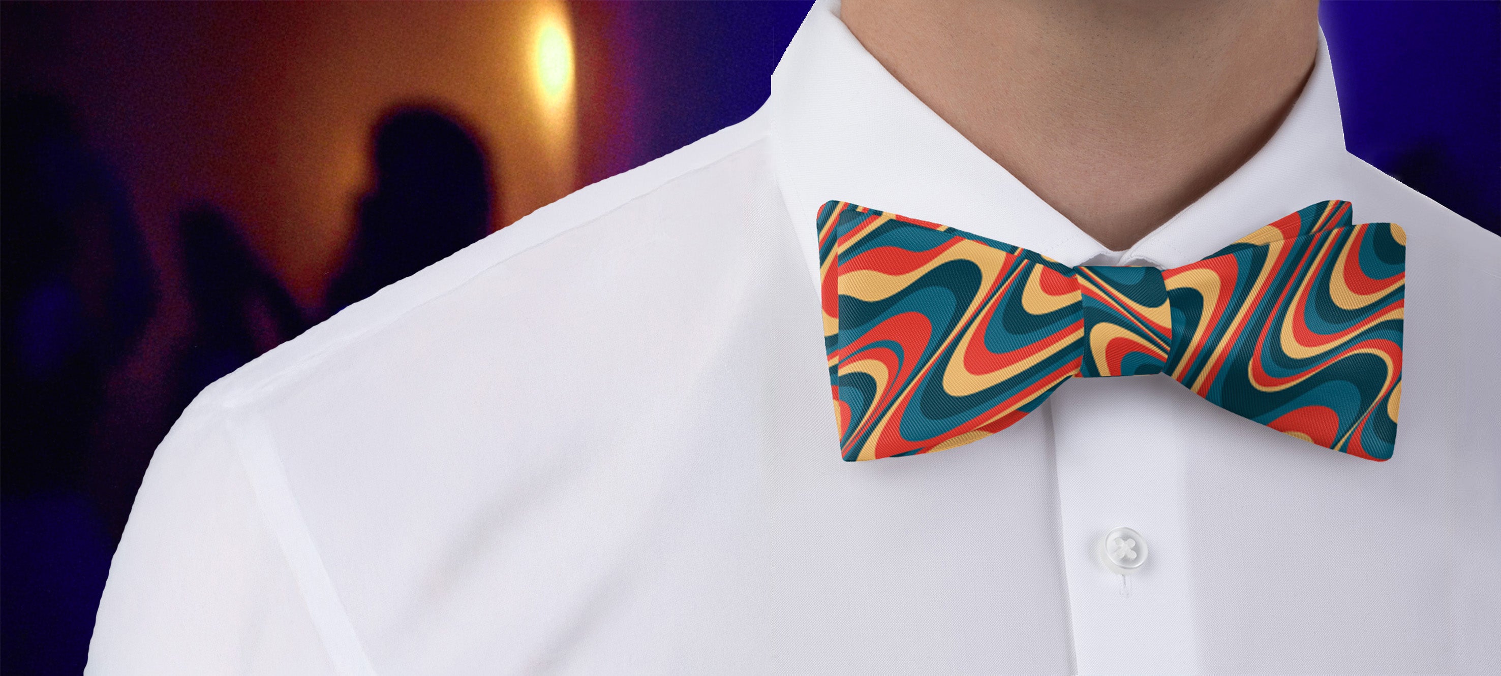 Colorful retro bow tie worn by a person with a blurred background