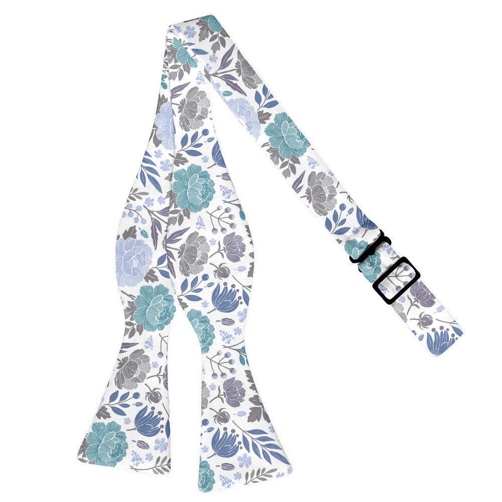 Floral patterned strap with a buckle on a white background