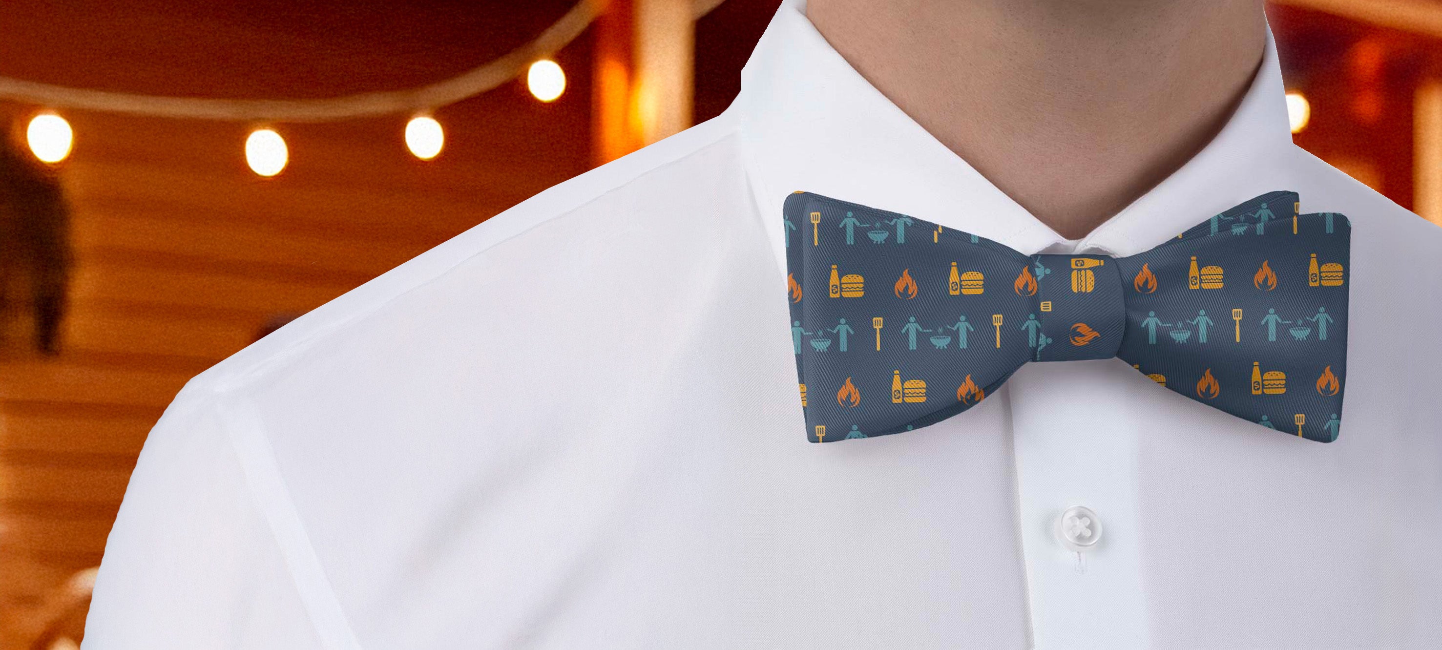 Person wearing a white shirt with a colorful friendship themed bow tie in an outdoor setting